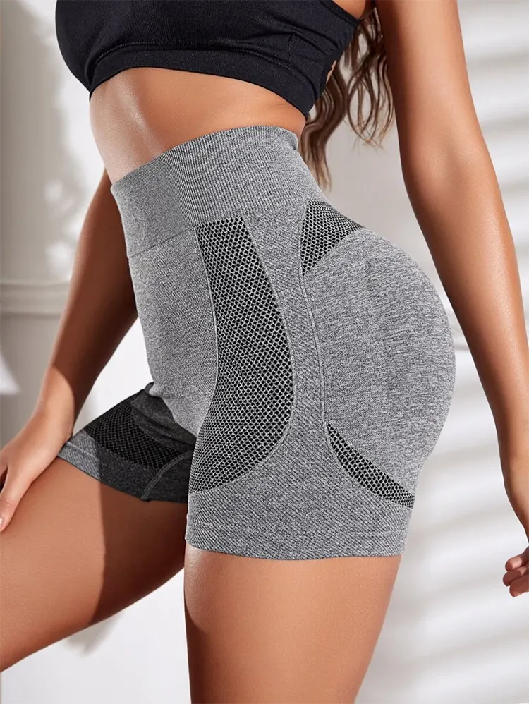 I leggings della pesca a maglie senza soluzione di continuità hanno vinto l'amore di sempre più donne